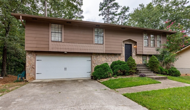 raised ranch featuring a garage