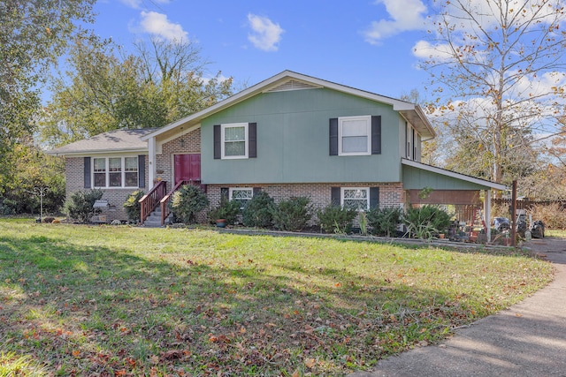 split level home with a front yard