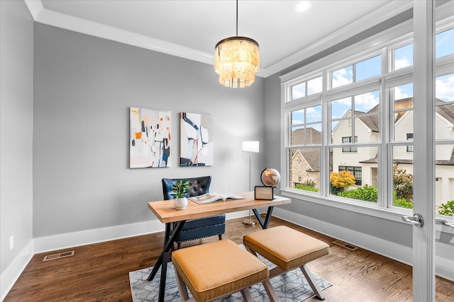 office area featuring wood-type flooring, crown molding, and a notable chandelier