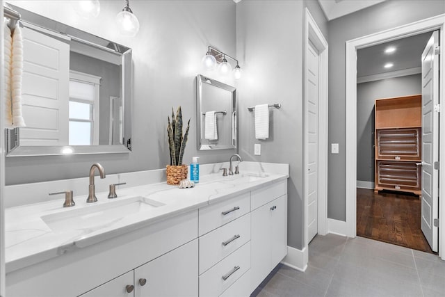 bathroom featuring tile patterned floors and vanity