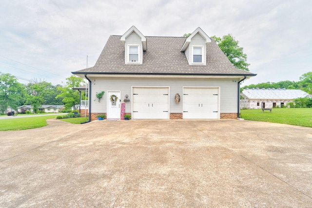 garage with a lawn