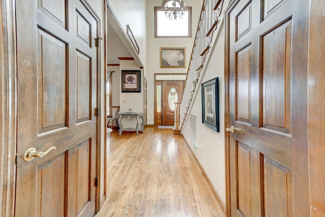 foyer entrance featuring light wood-type flooring