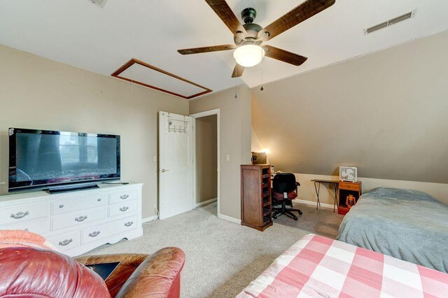 carpeted bedroom featuring ceiling fan and vaulted ceiling