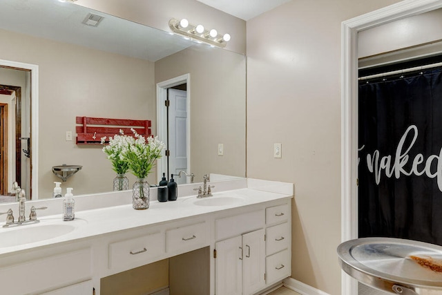 bathroom featuring vanity