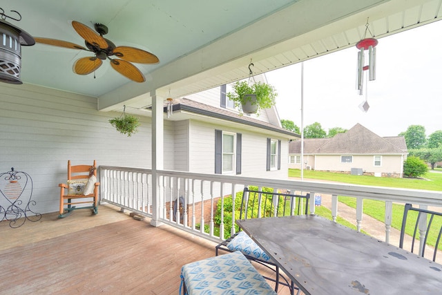 deck featuring ceiling fan and covered porch