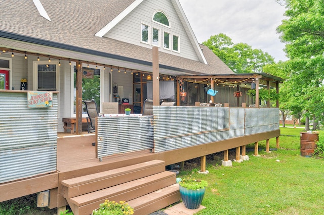 deck featuring a lawn