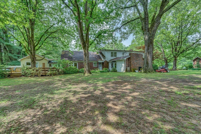 view of yard with a wooden deck