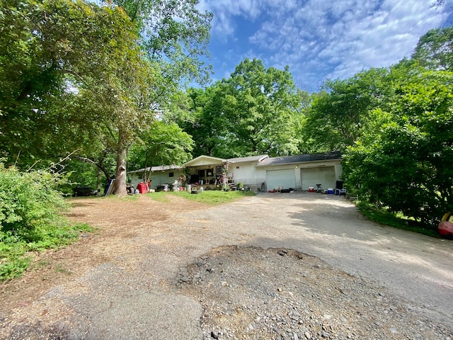 ranch-style home with a garage