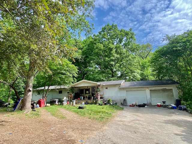 single story home featuring a garage