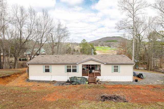 manufactured / mobile home featuring a mountain view