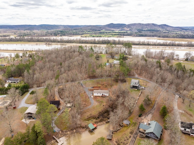 aerial view featuring a water and mountain view