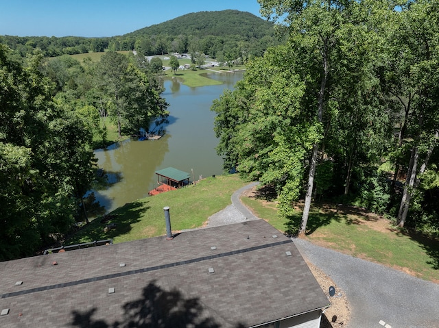 aerial view featuring a water and mountain view