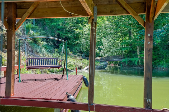 dock area featuring a water view