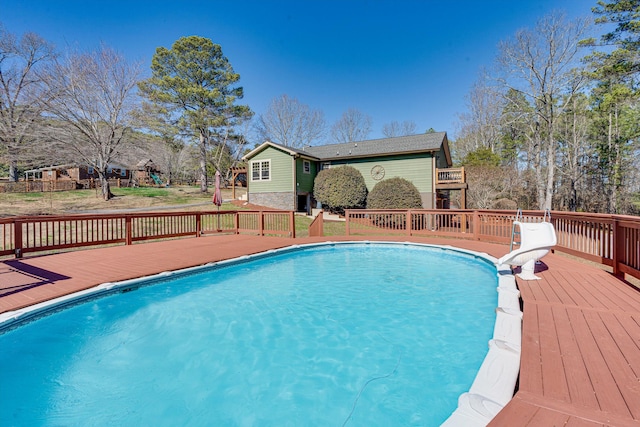 view of pool with a deck