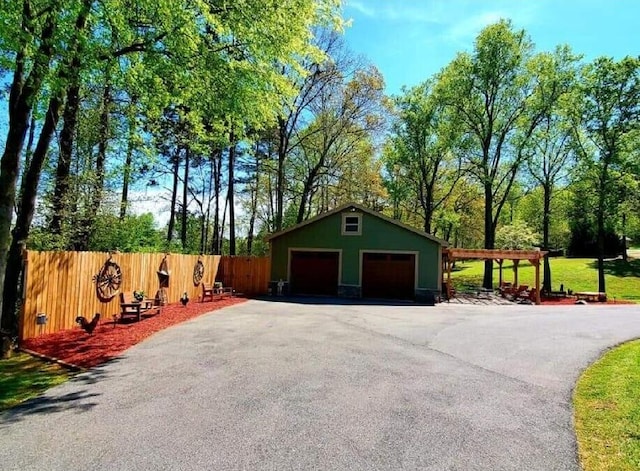 garage featuring wooden walls