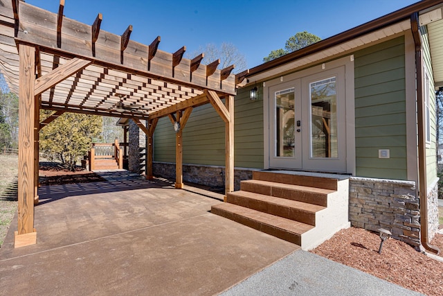 exterior space with a pergola, a patio, and french doors