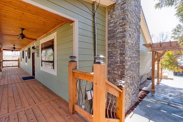 wooden deck with ceiling fan