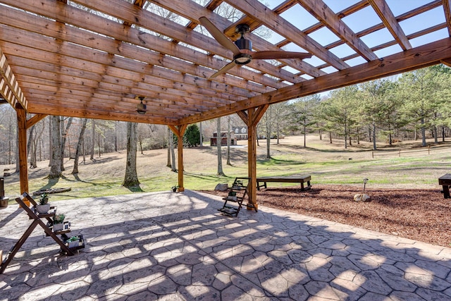 view of property's community with a pergola and a patio