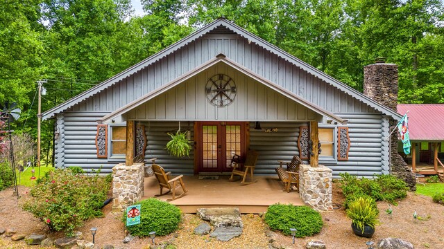 log home with a porch