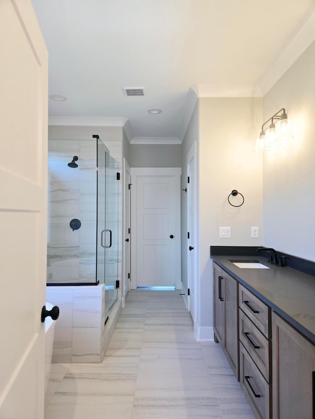 bathroom with vanity, walk in shower, and ornamental molding