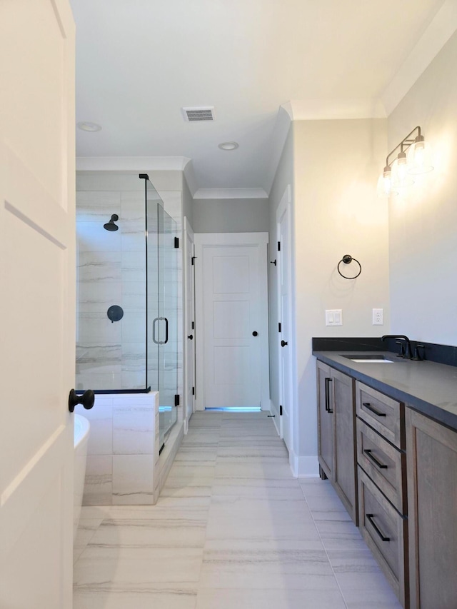 bathroom featuring shower with separate bathtub, vanity, and crown molding