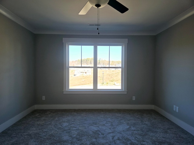 carpeted empty room featuring ceiling fan and ornamental molding