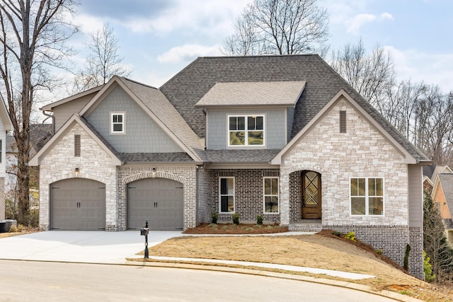 view of front facade with driveway, cooling unit, roof with shingles, an attached garage, and brick siding