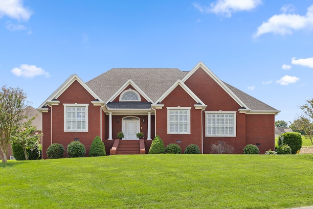 view of front of home with a front yard