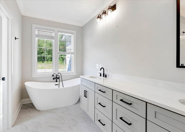 bathroom with crown molding, vanity, and a bath