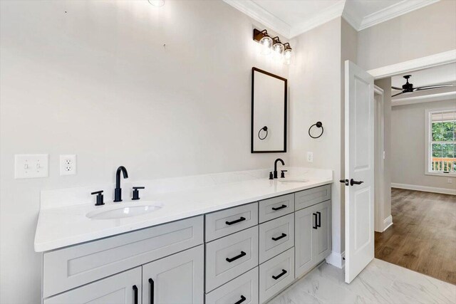 bathroom featuring crown molding, vanity, ceiling fan, and hardwood / wood-style floors