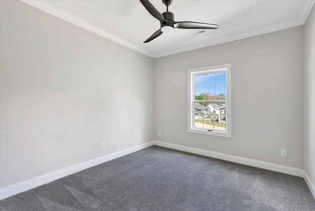 carpeted empty room with ceiling fan and ornamental molding