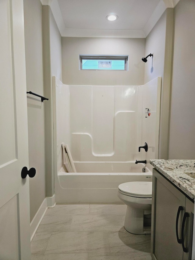 full bathroom featuring washtub / shower combination, toilet, crown molding, and vanity