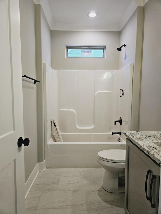 bathroom featuring vanity, toilet,  shower combination, and crown molding