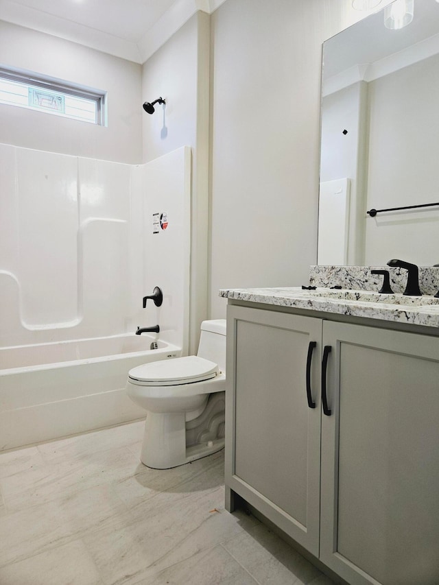 full bathroom with vanity, toilet, ornamental molding, and shower / washtub combination