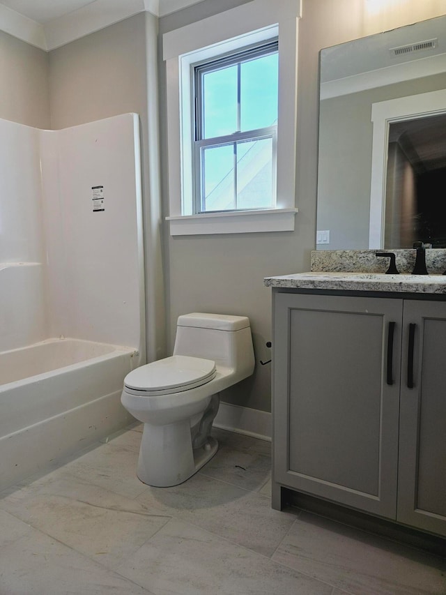 full bathroom featuring toilet, tub / shower combination, ornamental molding, and vanity