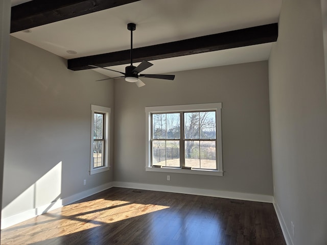 unfurnished room with dark wood-type flooring, beamed ceiling, a ceiling fan, and baseboards