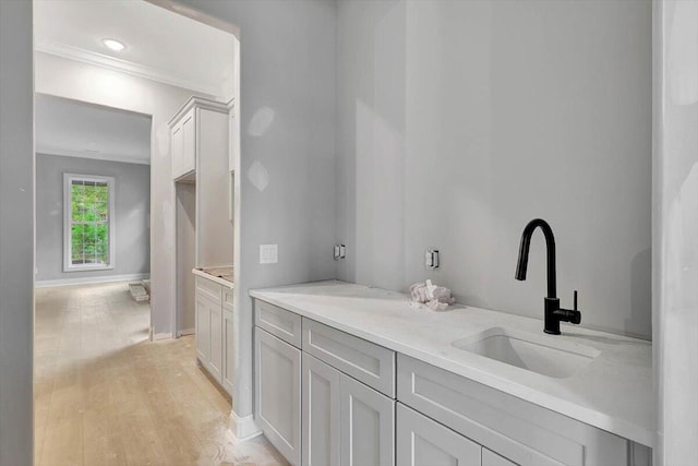 bathroom with vanity and hardwood / wood-style floors