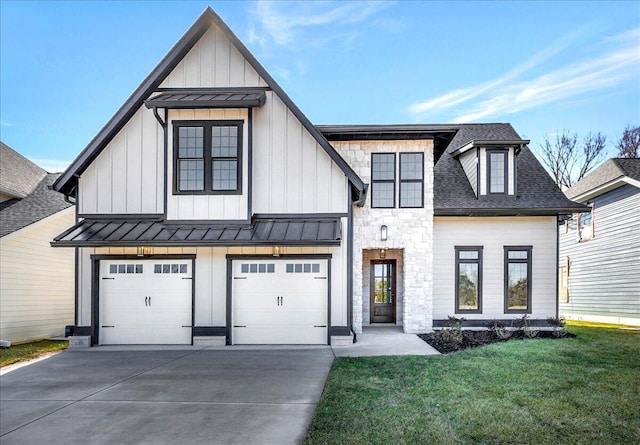 modern farmhouse with a garage and a front yard