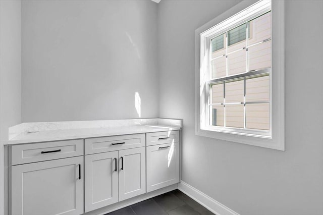 bathroom with tile patterned floors