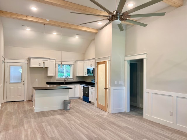 kitchen featuring black electric range oven, white cabinets, sink, light hardwood / wood-style floors, and beam ceiling