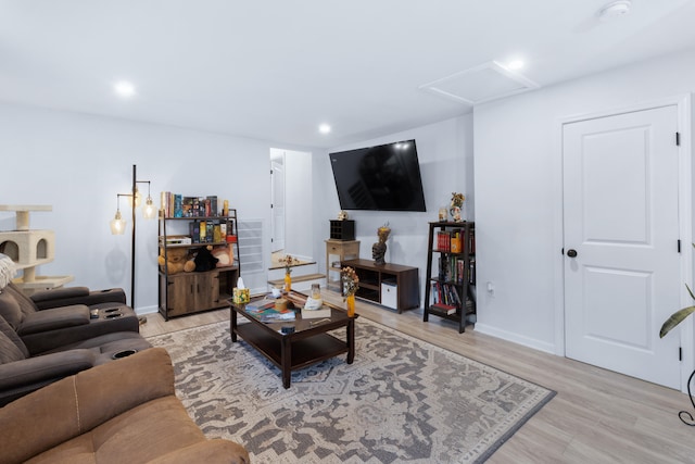 living room with light hardwood / wood-style floors