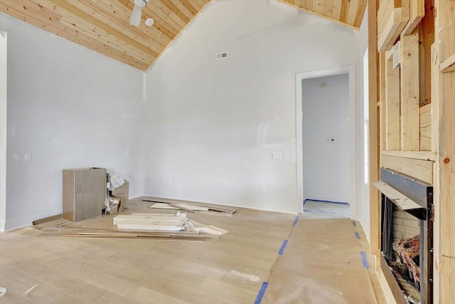 living room with wooden ceiling, light hardwood / wood-style floors, ceiling fan, and high vaulted ceiling