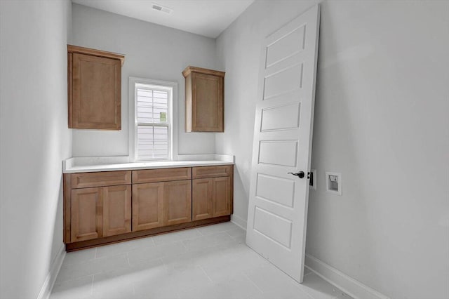 kitchen featuring light tile patterned flooring