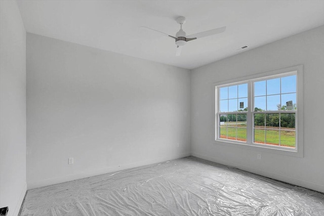 spare room with ceiling fan