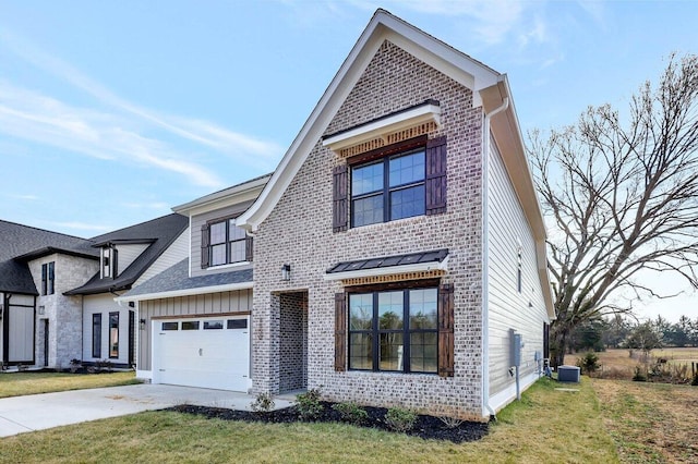 view of front of house featuring a garage, a front yard, and central air condition unit