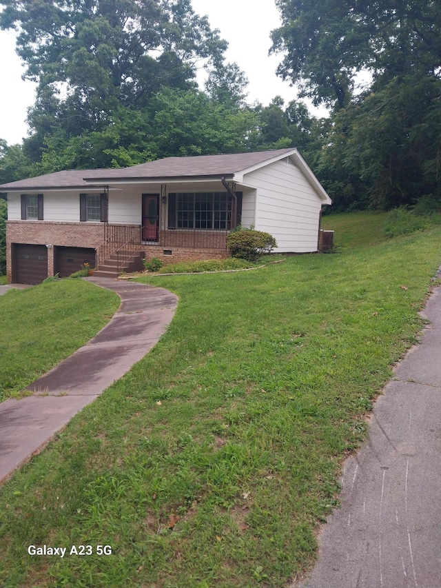 view of front of house with a porch and a front yard