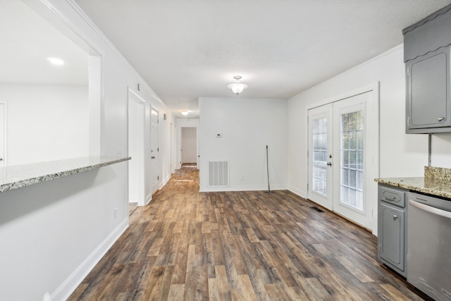 interior space featuring gray cabinetry, french doors, dark hardwood / wood-style flooring, light stone countertops, and dishwasher