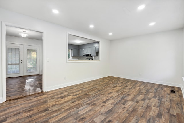 interior space with french doors and dark wood-type flooring