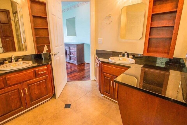 bathroom with tile patterned floors and sink