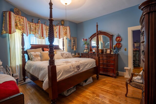 bedroom with light hardwood / wood-style flooring